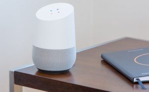 large google home voice on end table